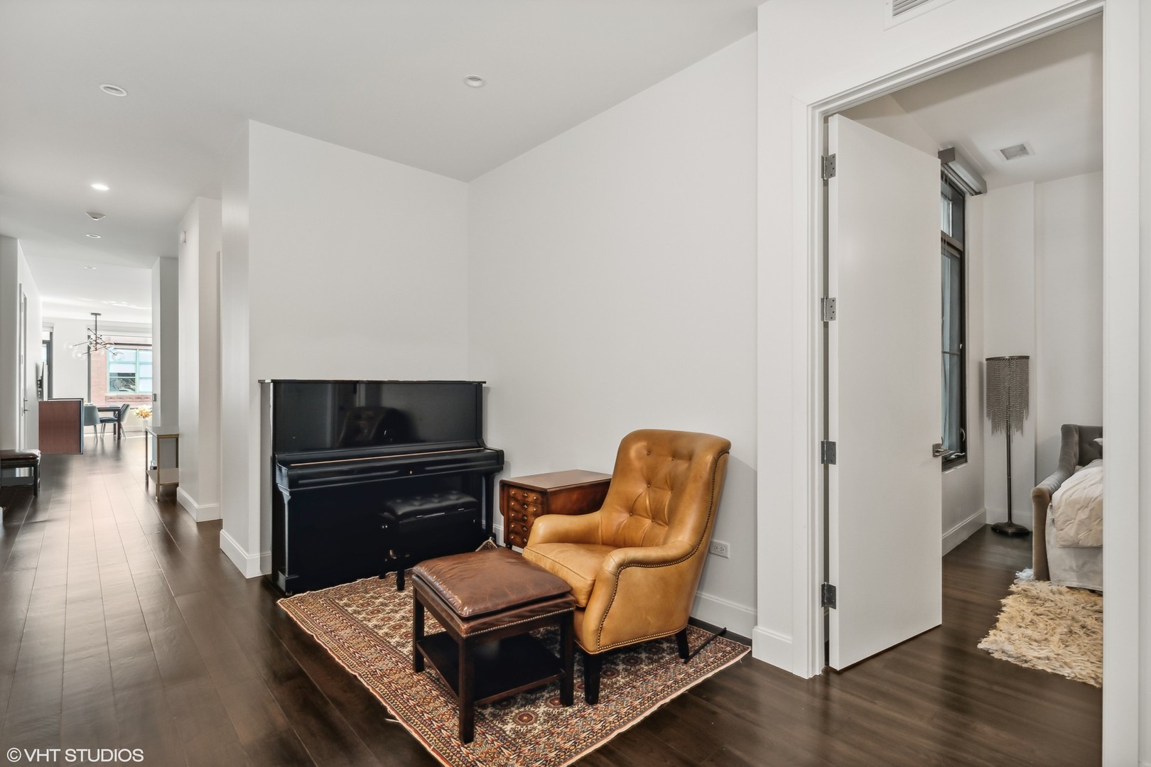 40 North Carpenter Street, Unit 4S Chicago, IL 60607 - Photo 17 of 25 a living room with furniture and a flat screen tv