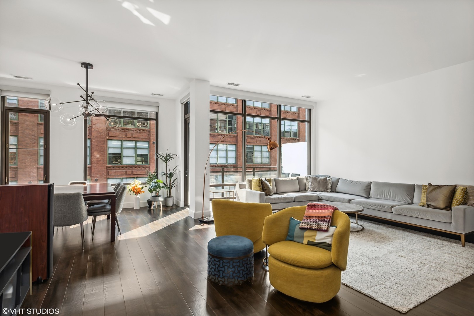 40 North Carpenter Street, Unit 4S Chicago, IL 60607 - Photo 4 of 25 a living room with furniture and a large window