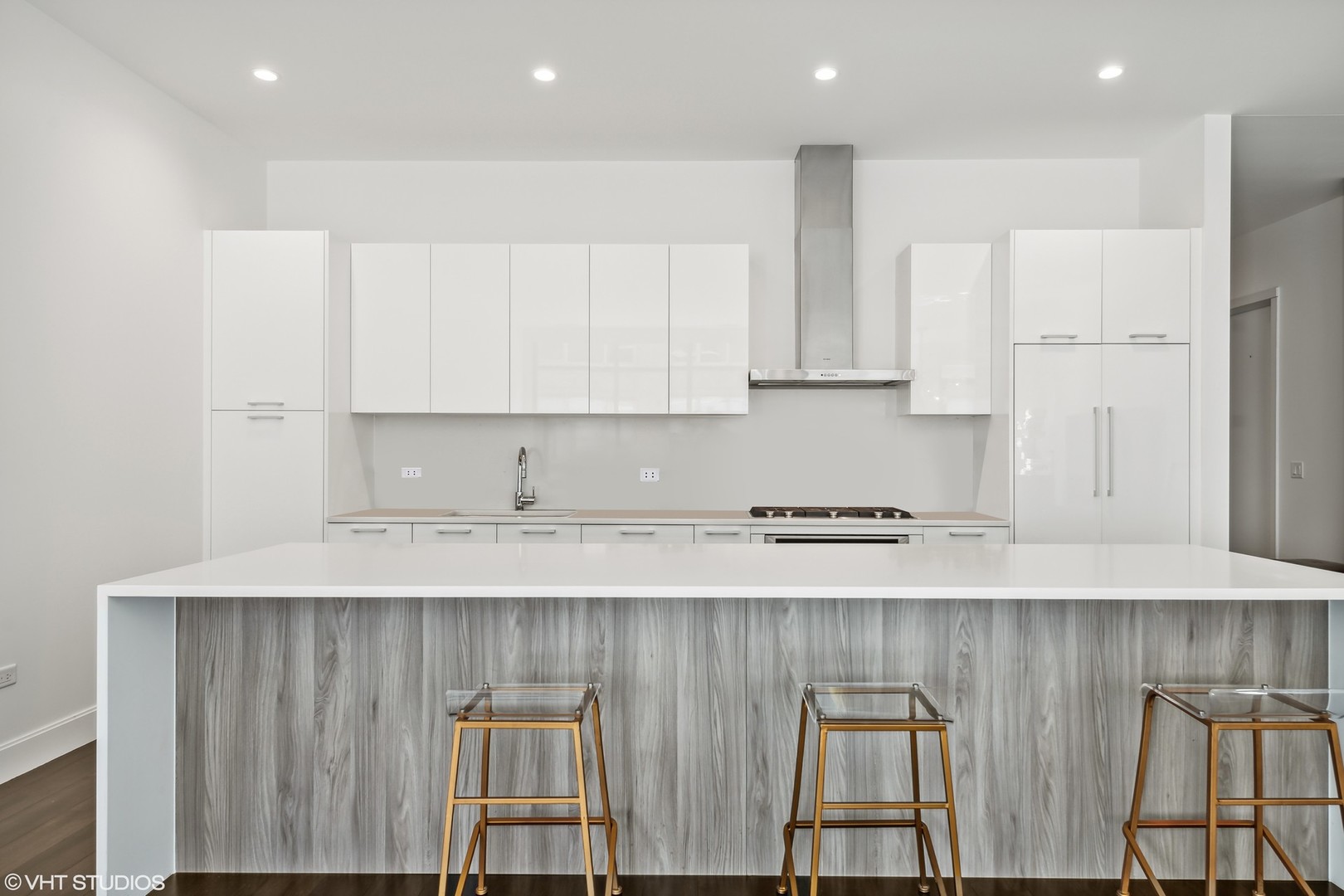 40 North Carpenter Street, Unit 4S Chicago, IL 60607 - Photo 9 of 25 view of kitchen with stainless steel appliances granite countertop a stove a sink and white cabinets
