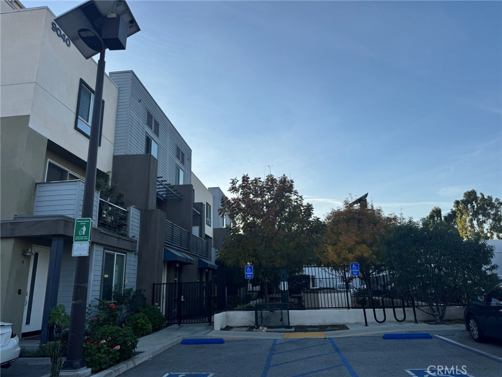 9042 Garvey Avenue, Unit 16 Rosemead, CA 91770 - Photo 17 of 28 a front view of a building with tree s