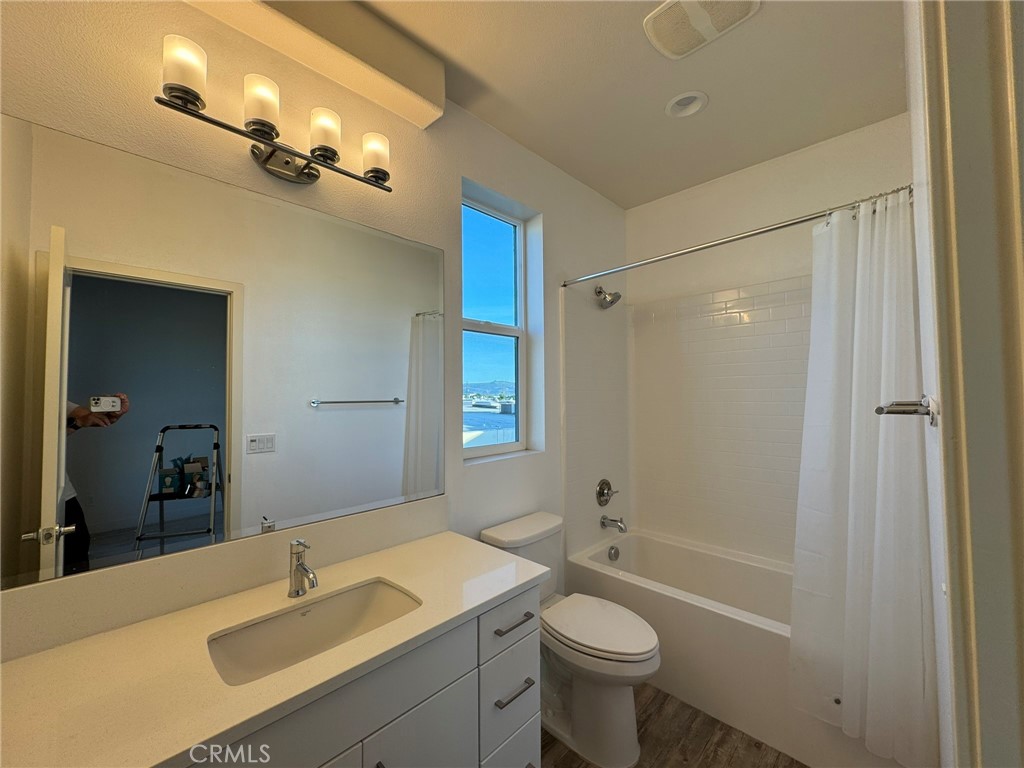 9042 Garvey Avenue, Unit 16 Rosemead, CA 91770 - Photo 4 of 28 a bathroom with a sink double vanity granite toilet tub and shower