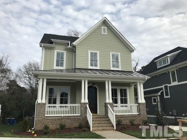 902 Norris Street Raleigh, NC 27604 - Photo 1 of 25 Enjoy the community feel from your full front porch! Fiber cement siding, brick filled porch floor, bead board ceiling, metal porch roof, brick lead-walk, irrigated yard maintained by the HOA.