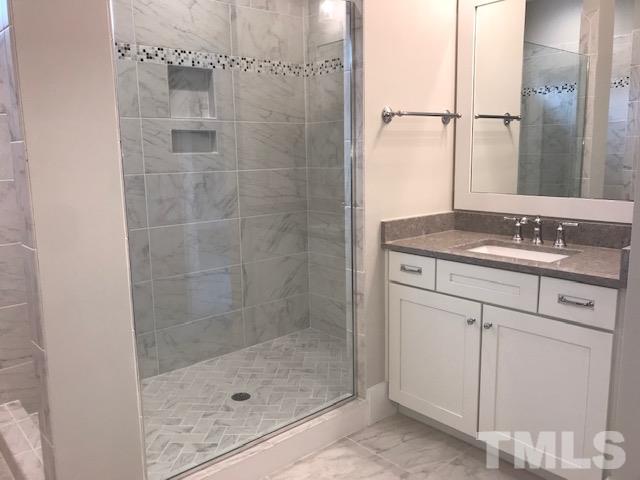 902 Norris Street Raleigh, NC 27604 - Photo 16 of 25 Super Shower with separate sinks, separate walk in closets and private water closet