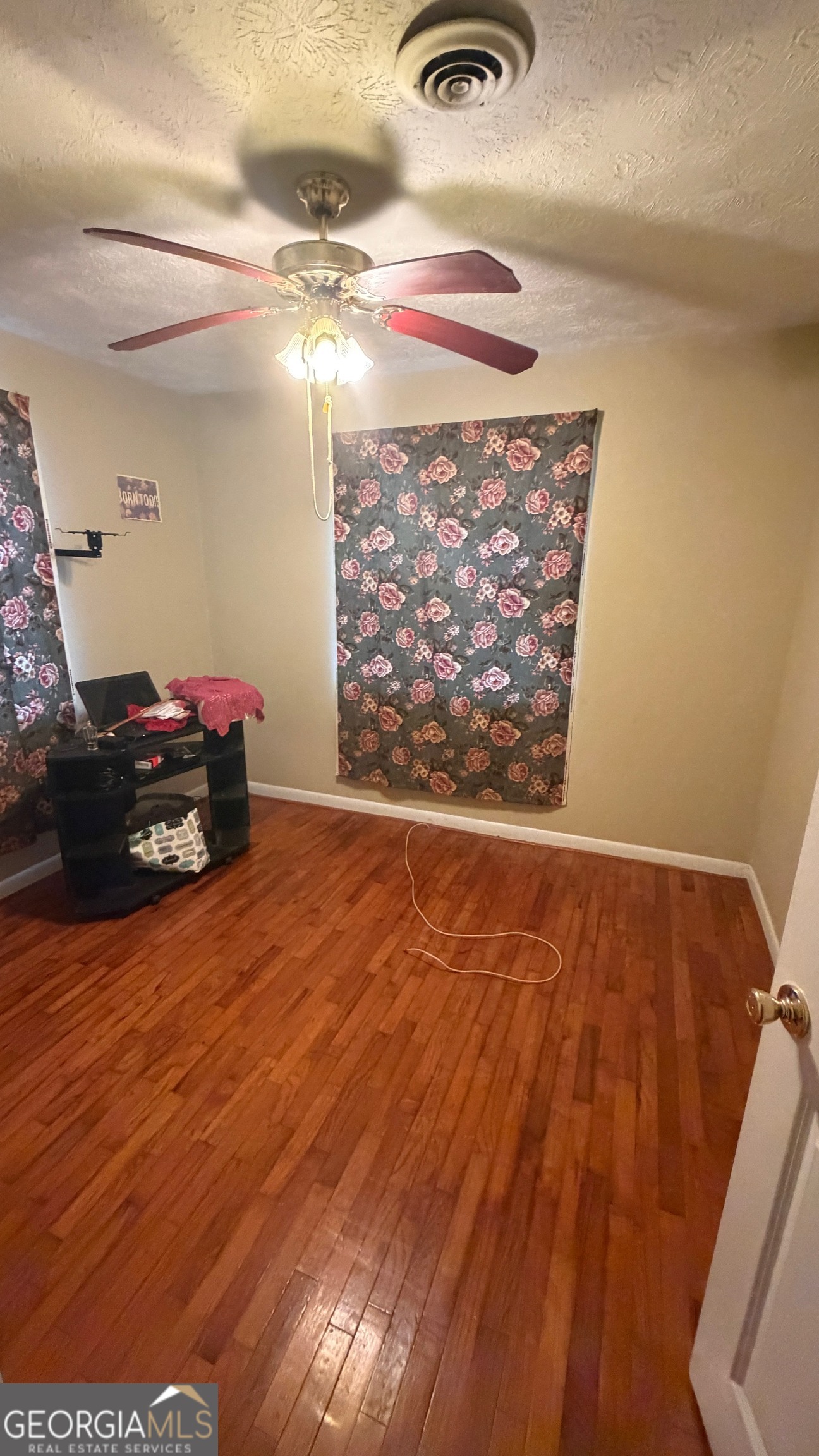 203 Salem Drive Northwest Rome, GA 30165 - Photo 13 of 15 a view of a livingroom with wooden floor