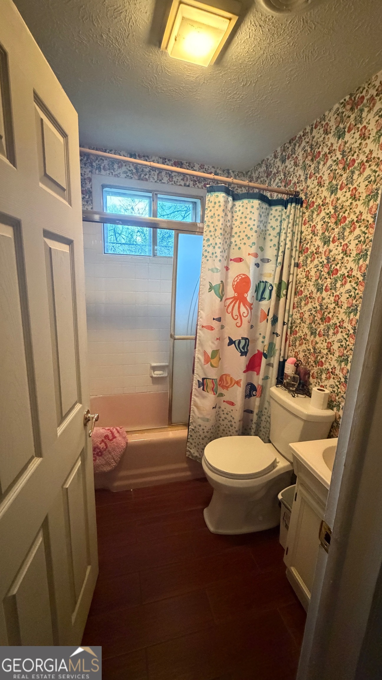 203 Salem Drive Northwest Rome, GA 30165 - Photo 14 of 15 a bathroom with a toilet a sink and bathtub