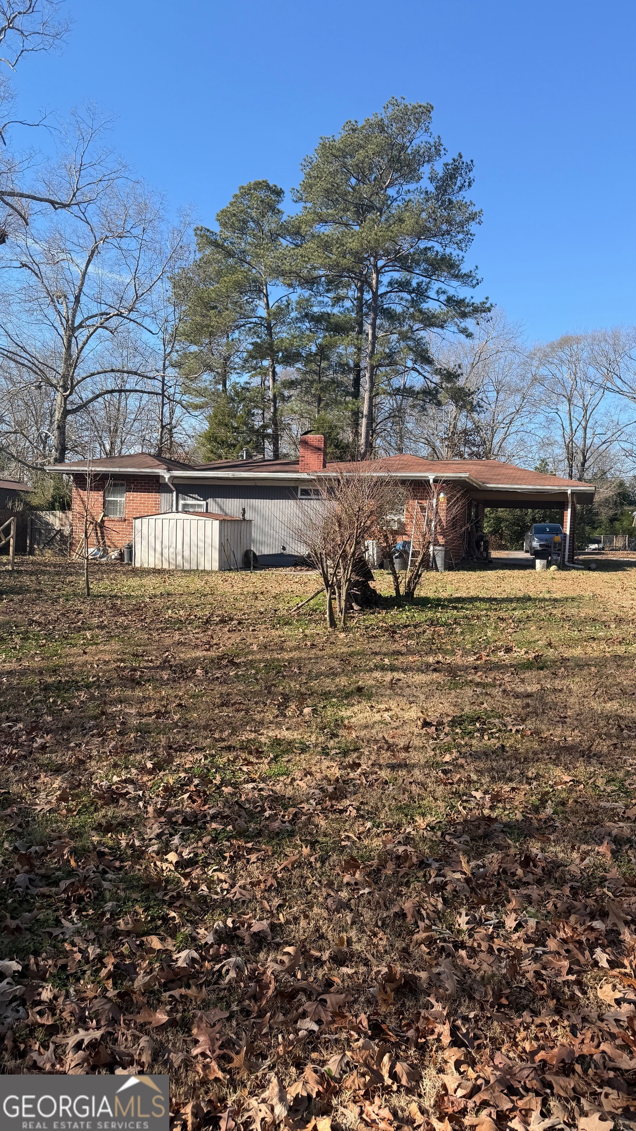 203 Salem Drive Northwest Rome, GA 30165 - Photo 4 of 4 a view of a house with a yard