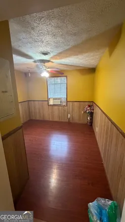 a view of a livingroom with wooden floor