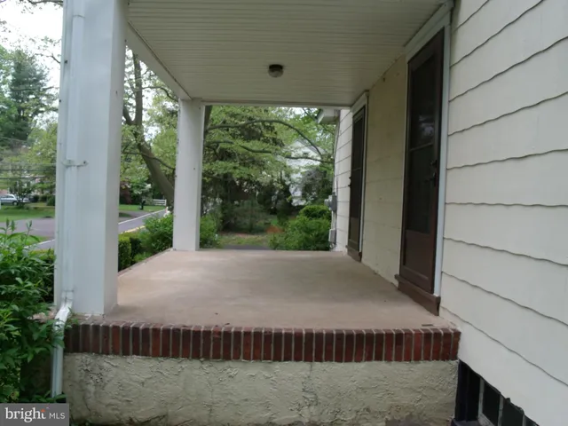 a view of balcony with furniture