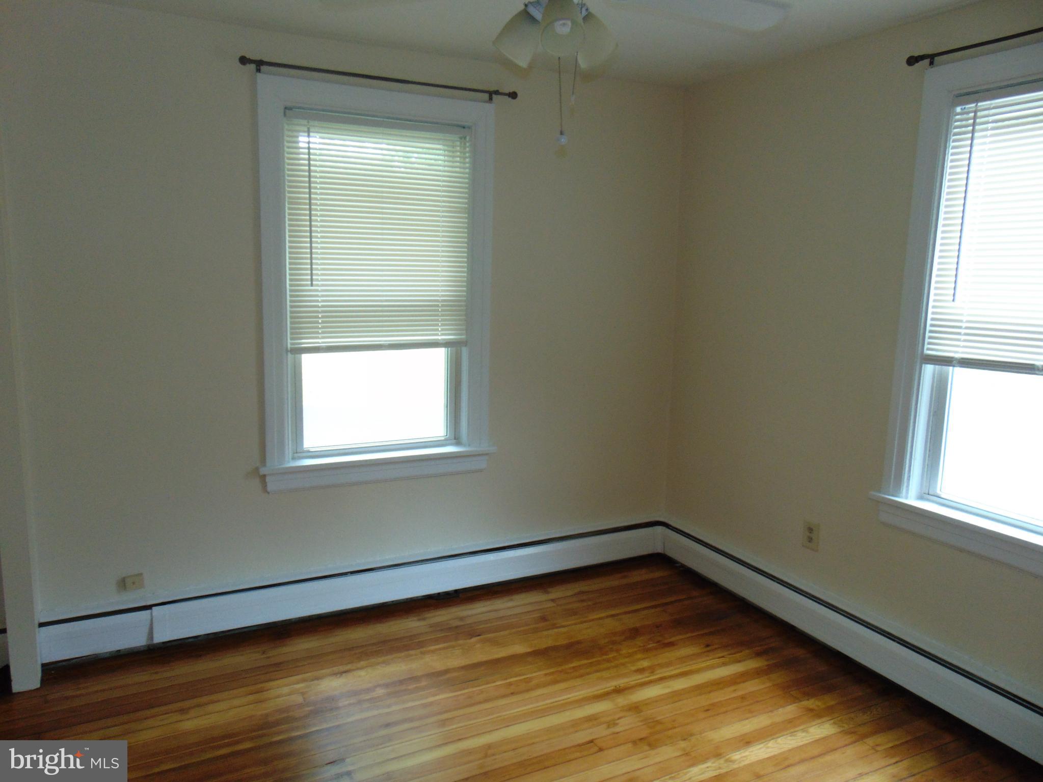 1311 Bristol Road, Unit 1 Churchville, PA 18966 - Photo 9 of 13 an empty room with a window