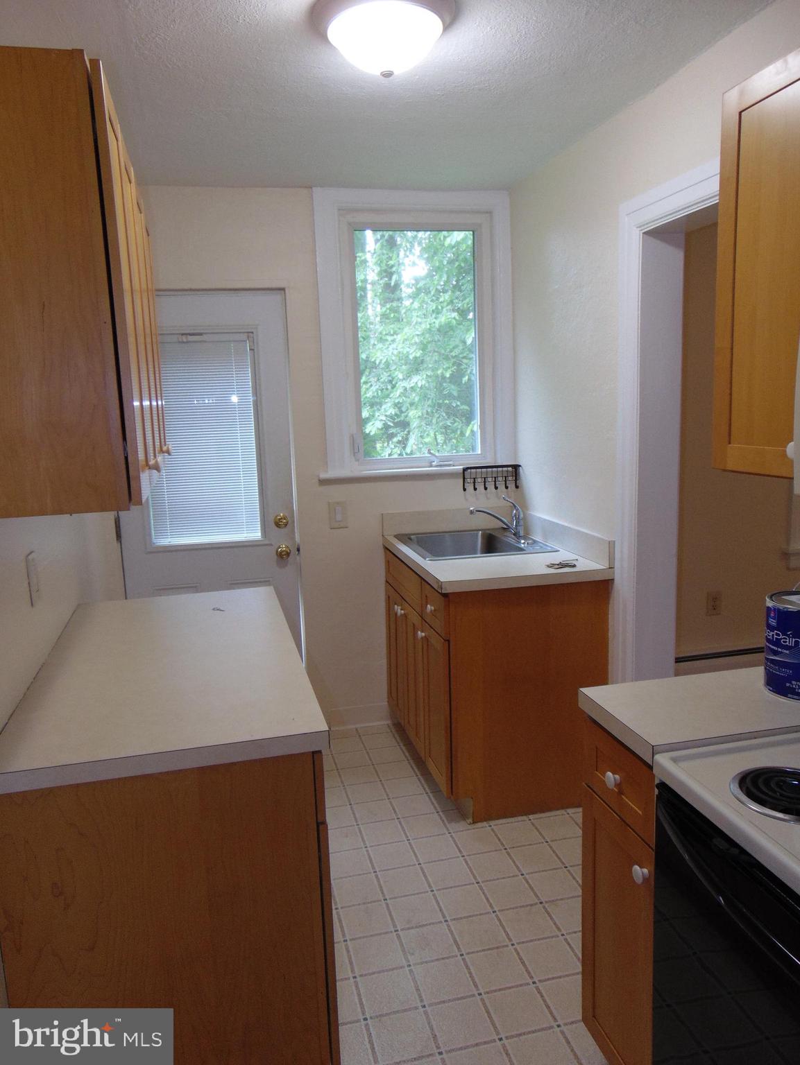 1311 Bristol Road, Unit 1 Churchville, PA 18966 - Photo 10 of 13 a bathroom with a sink a vanity and a mirror