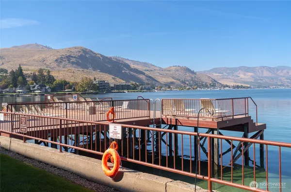 a view of a chairs on the roof deck