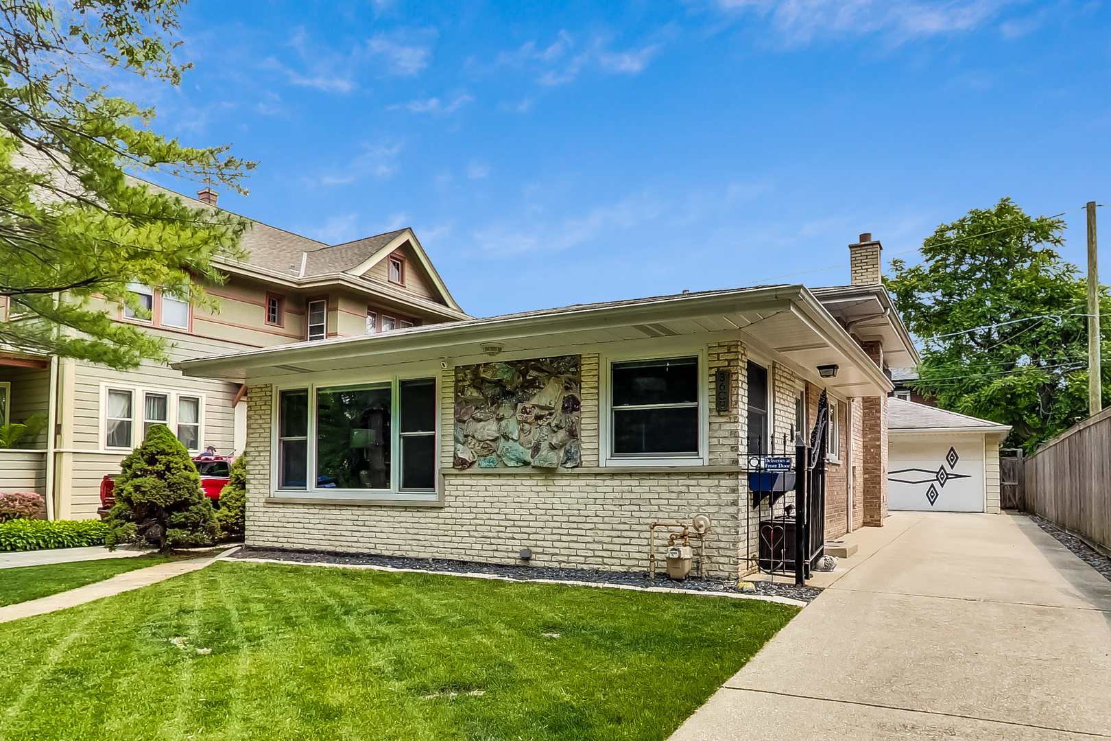 3609 North Harding Avenue Chicago, IL 60618 - Photo 1 of 41 a front view of a house with a yard
