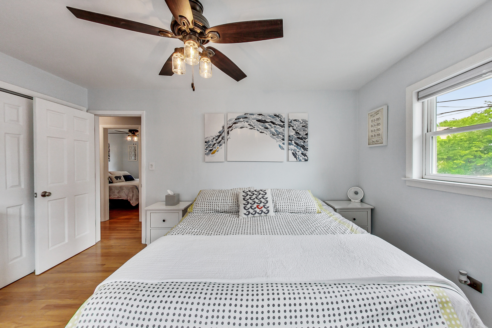 3609 North Harding Avenue Chicago, IL 60618 - Photo 14 of 41 a bedroom with a large bed and a window