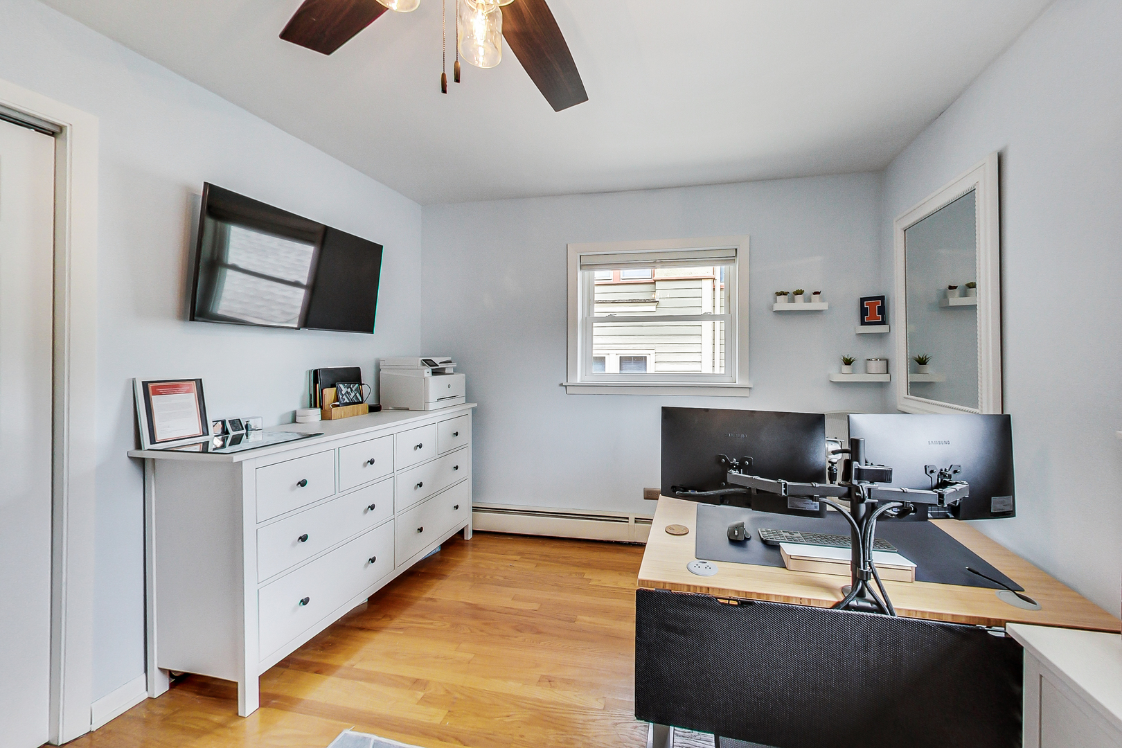 3609 North Harding Avenue Chicago, IL 60618 - Photo 19 of 41 a room with furniture and flat screen tv