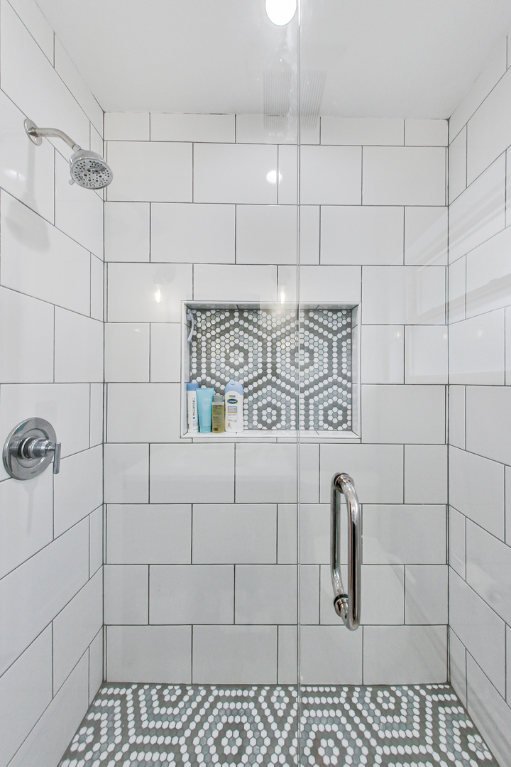 3609 North Harding Avenue Chicago, IL 60618 - Photo 23 of 41 a bathroom with a shower