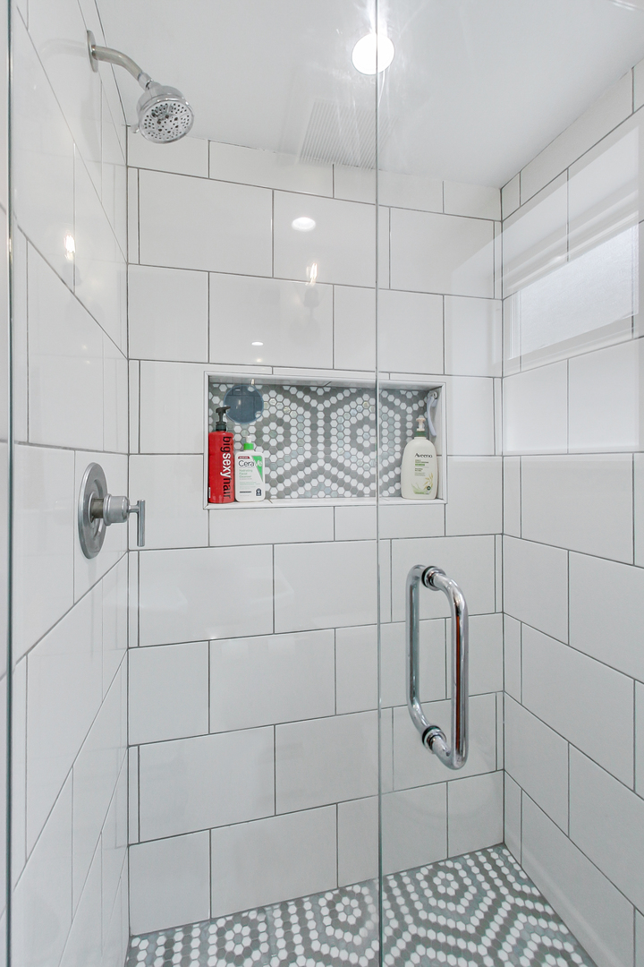 3609 North Harding Avenue Chicago, IL 60618 - Photo 28 of 41 a bathroom with a shower