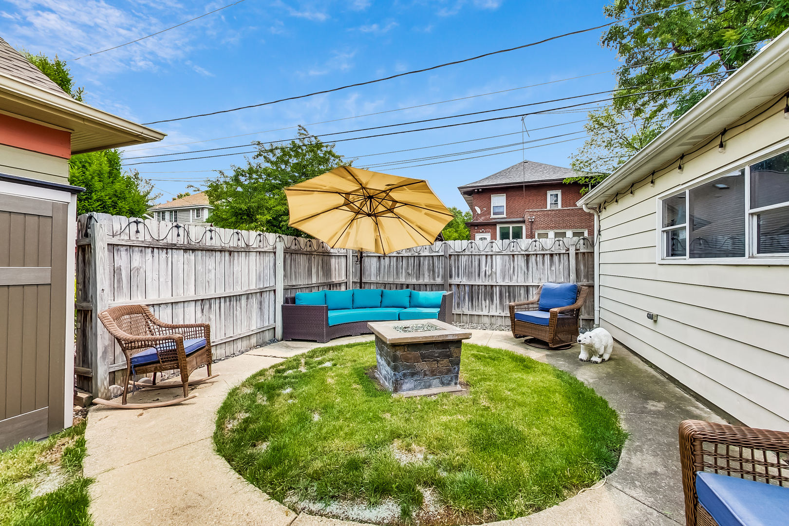 3609 North Harding Avenue Chicago, IL 60618 - Photo 33 of 41 a view of a chair and table in backyard of the house
