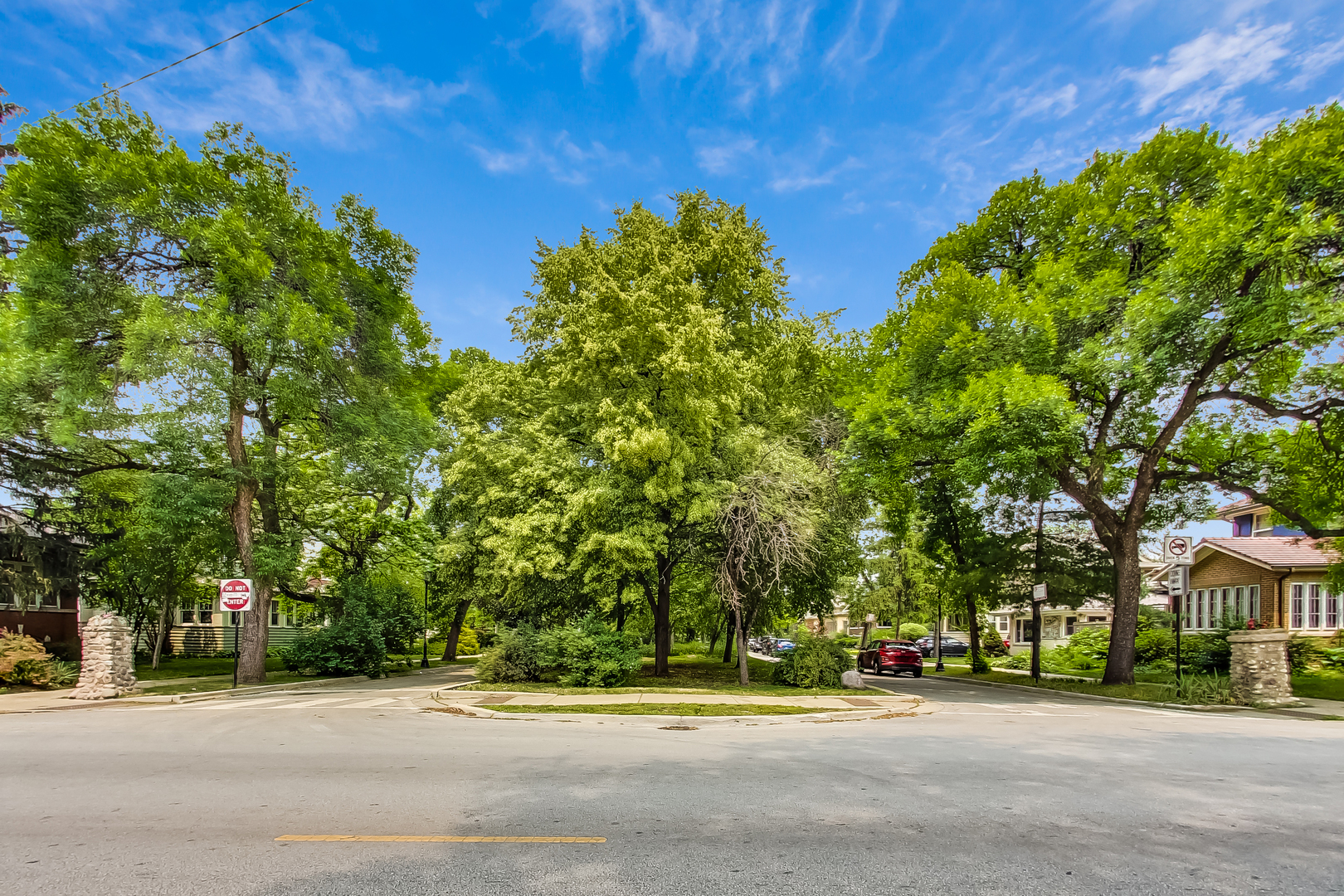 3609 North Harding Avenue Chicago, IL 60618 - Photo 36 of 41 a road view with a building in the background