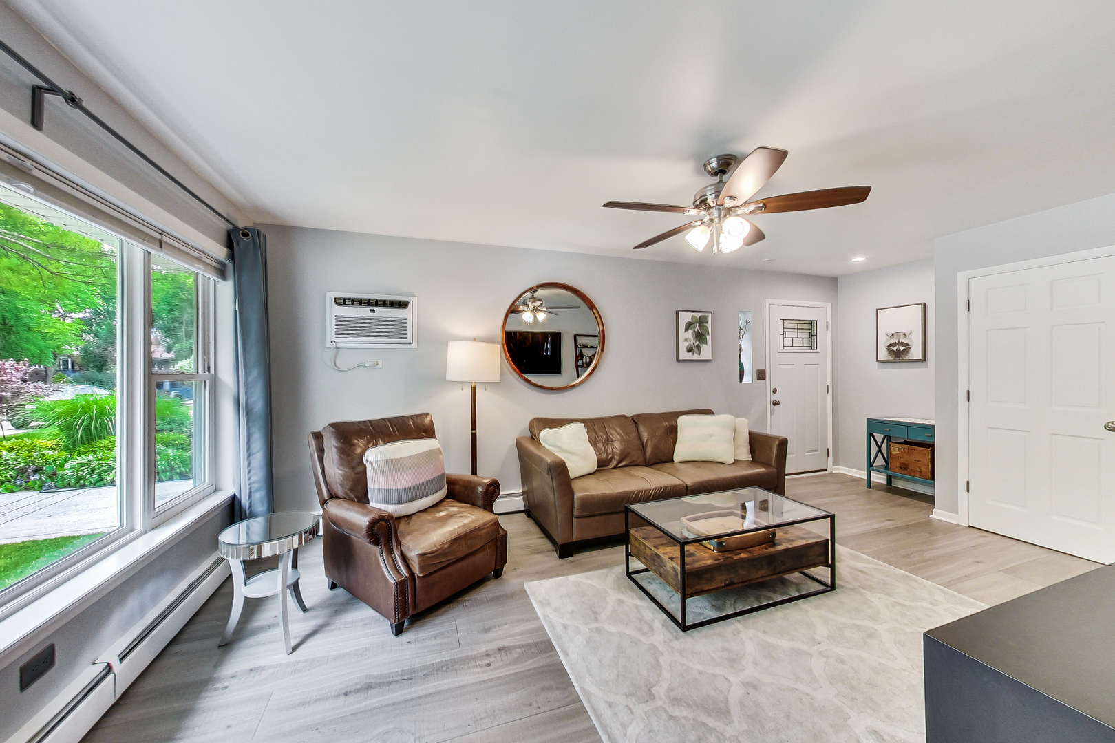3609 North Harding Avenue Chicago, IL 60618 - Photo 6 of 41 a living room with furniture a table and a large window