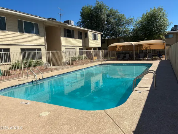 a view of a house with backyard