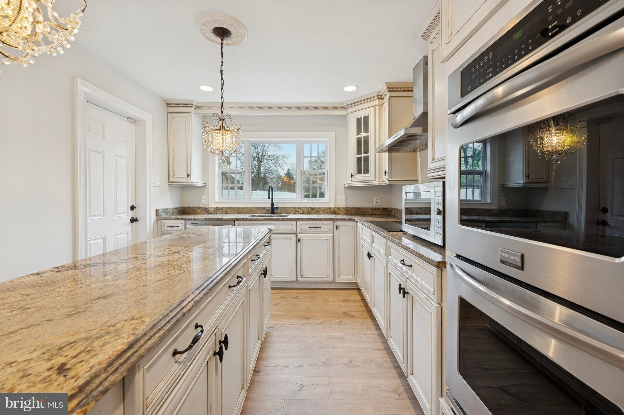 440 Rittenhouse Boulevard Jeffersonville, PA 19403 - Photo 15 of 45 a large kitchen with granite countertop a sink and cabinets