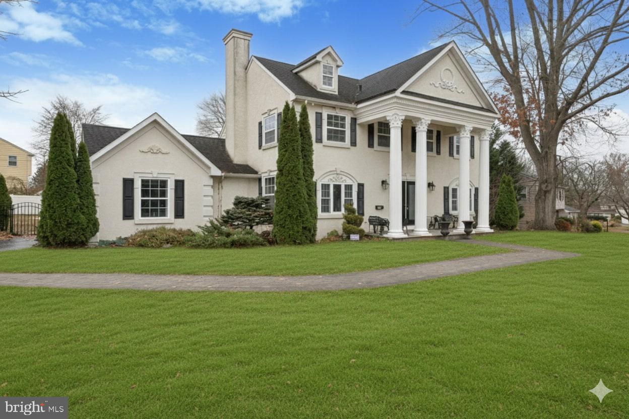 440 Rittenhouse Boulevard Jeffersonville, PA 19403 - Photo 2 of 45 a front view of a house with a yard