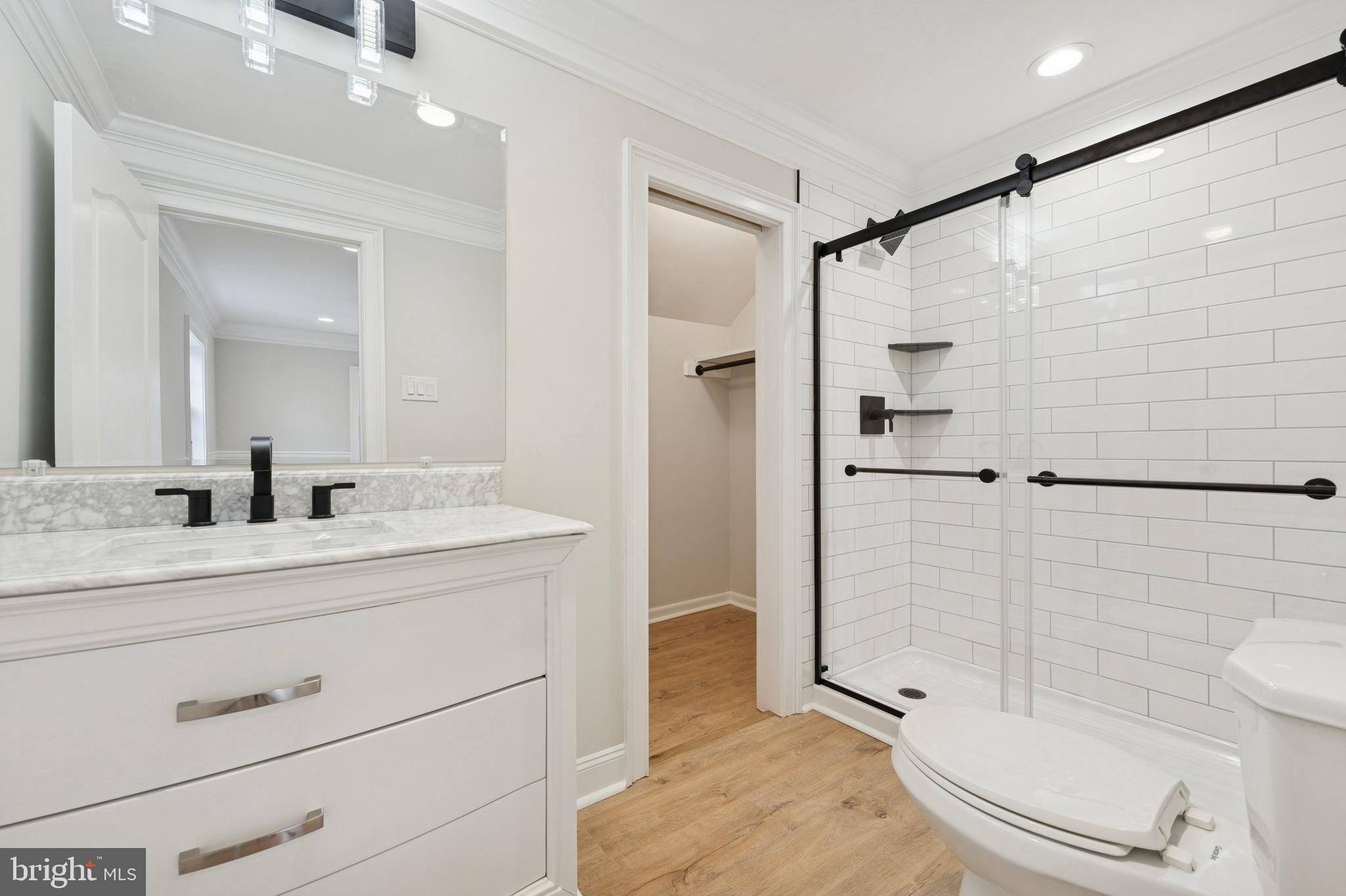 440 Rittenhouse Boulevard Jeffersonville, PA 19403 - Photo 26 of 45 a bathroom with a granite countertop sink toilet and shower