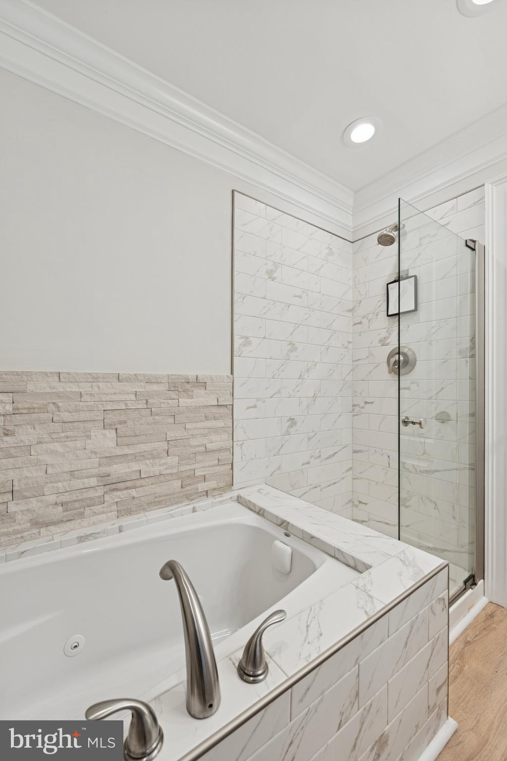 440 Rittenhouse Boulevard Jeffersonville, PA 19403 - Photo 33 of 45 a bathroom with a tub sink and shower