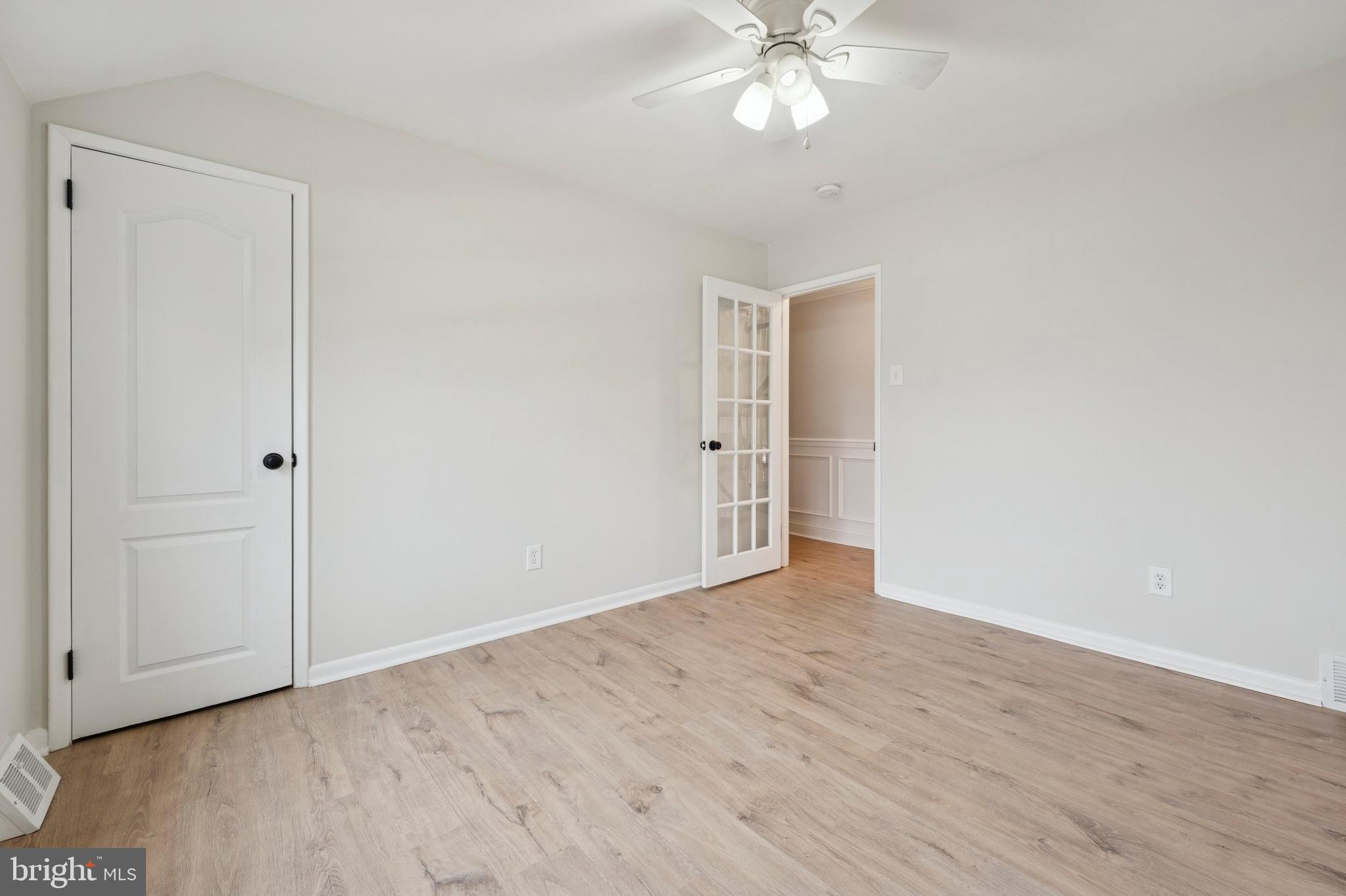 440 Rittenhouse Boulevard Jeffersonville, PA 19403 - Photo 35 of 45 a view of an empty room with wooden floor