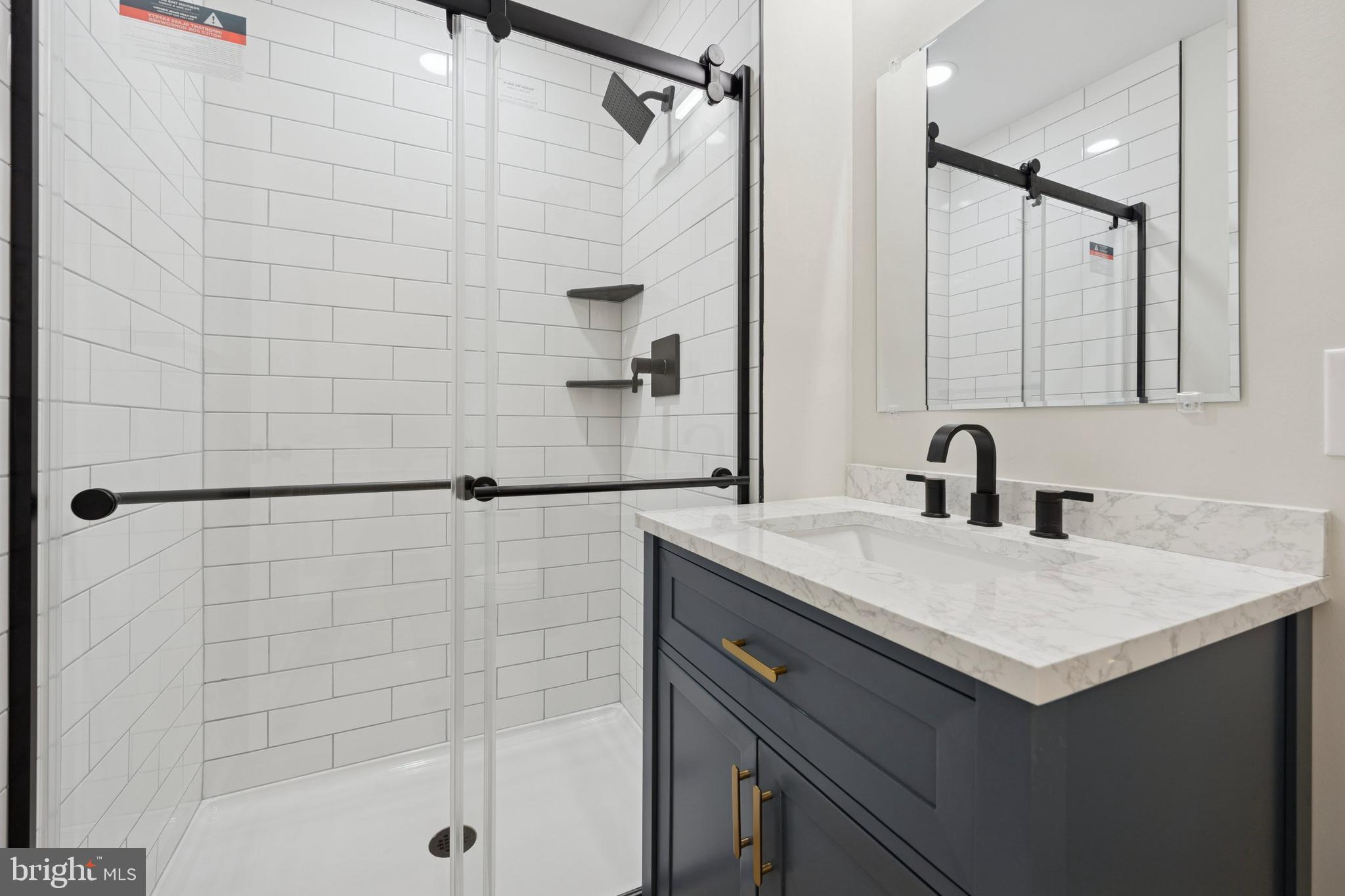 440 Rittenhouse Boulevard Jeffersonville, PA 19403 - Photo 38 of 45 a bathroom with a sink and a shower