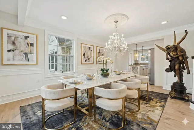 a view of livingroom with furniture and a chandelier