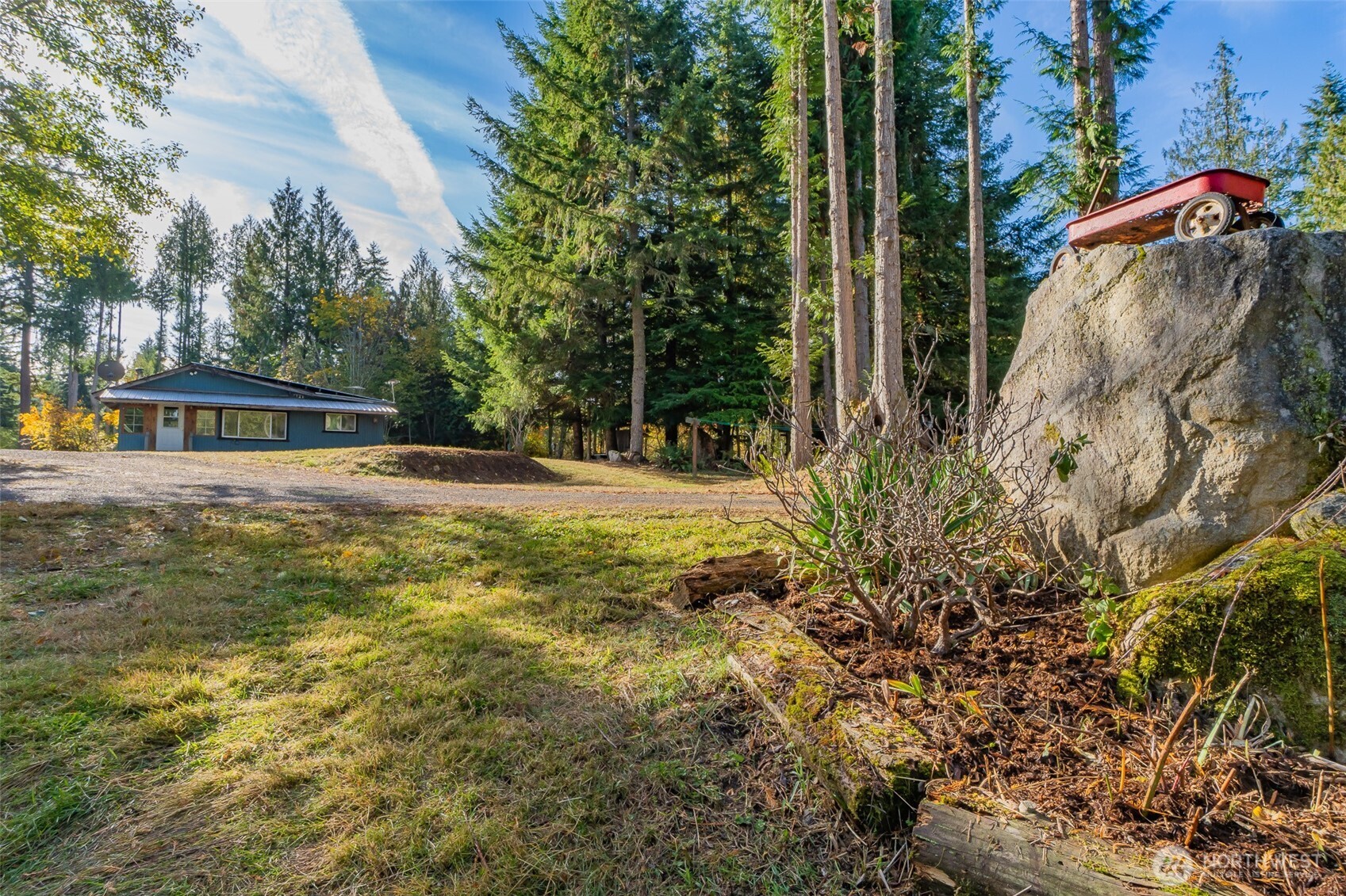 17328 Mulqueen Road Southeast Rainier, WA 98576 - Photo 20 of 38 a view of a house with a yard
