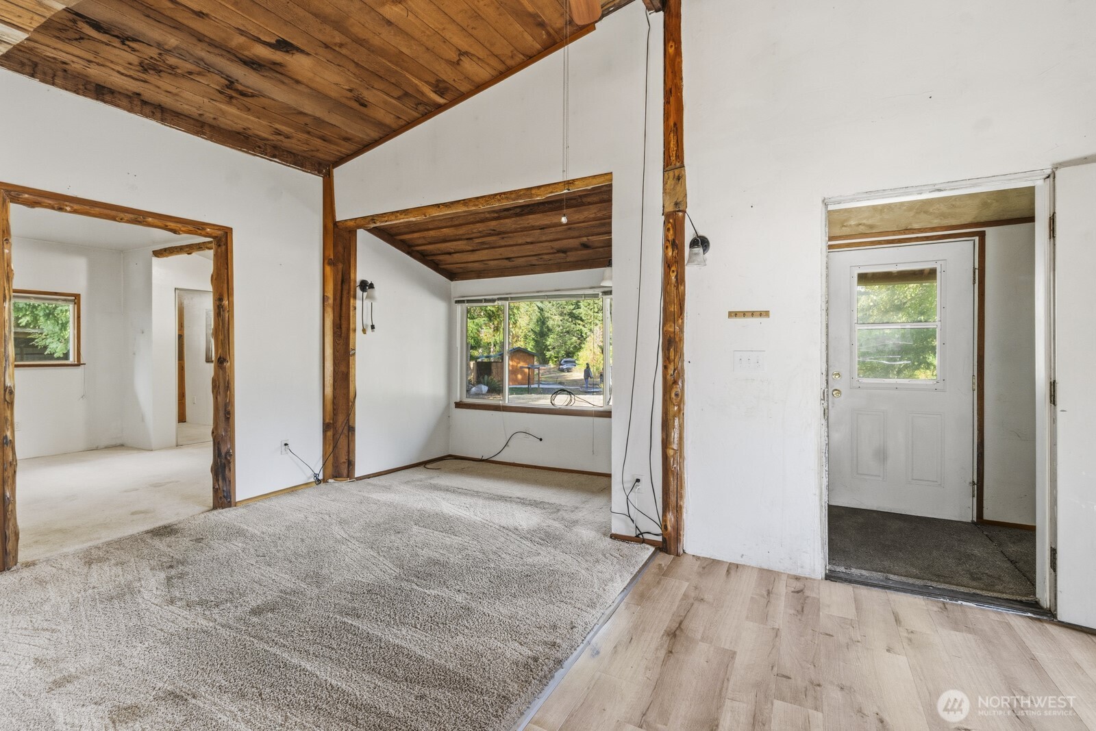 17328 Mulqueen Road Southeast Rainier, WA 98576 - Photo 21 of 24 an empty room with windows and closet