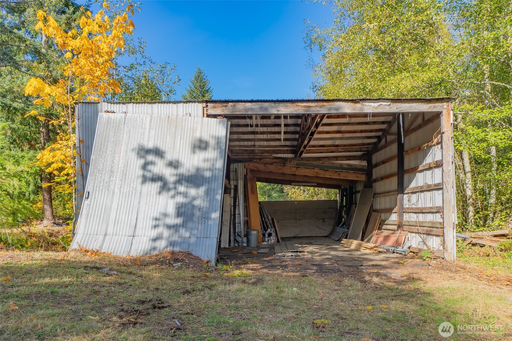 17328 Mulqueen Road Southeast Rainier, WA 98576 - Photo 8 of 24 a view of outdoor space garage and basketball court