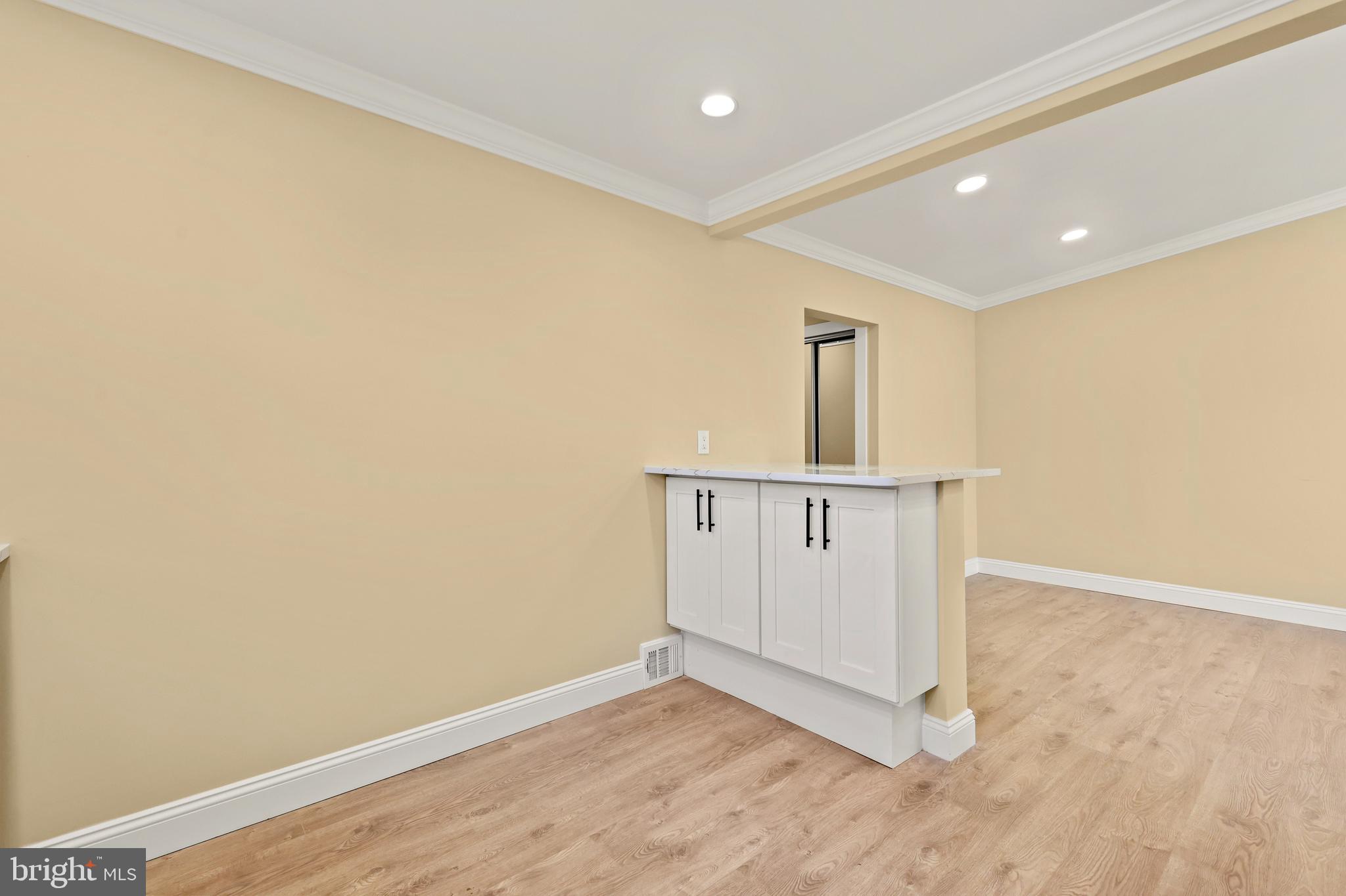 602 Wanamaker Road Jenkintown, PA 19046 - Photo 11 of 39 an empty room with wooden floor and a window