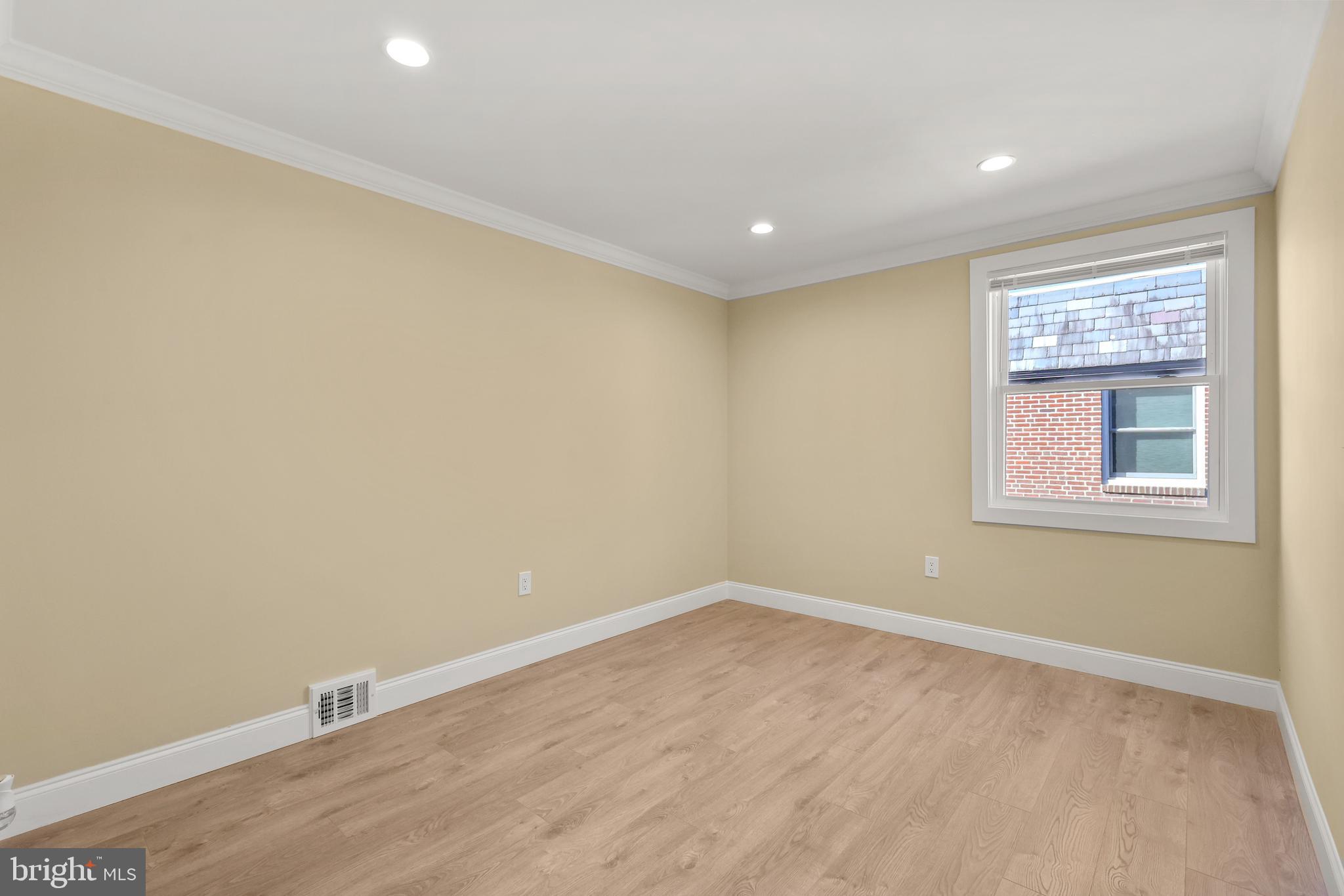 602 Wanamaker Road Jenkintown, PA 19046 - Photo 13 of 39 a view of a room with wooden floor and windows