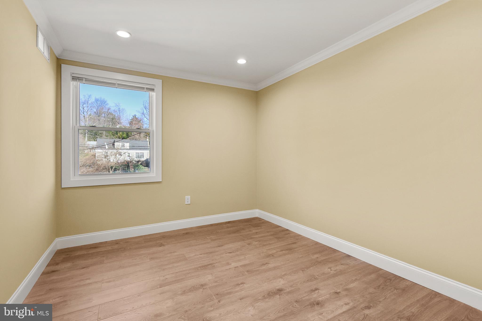 602 Wanamaker Road Jenkintown, PA 19046 - Photo 17 of 39 a view of a big room with wooden floor and windows