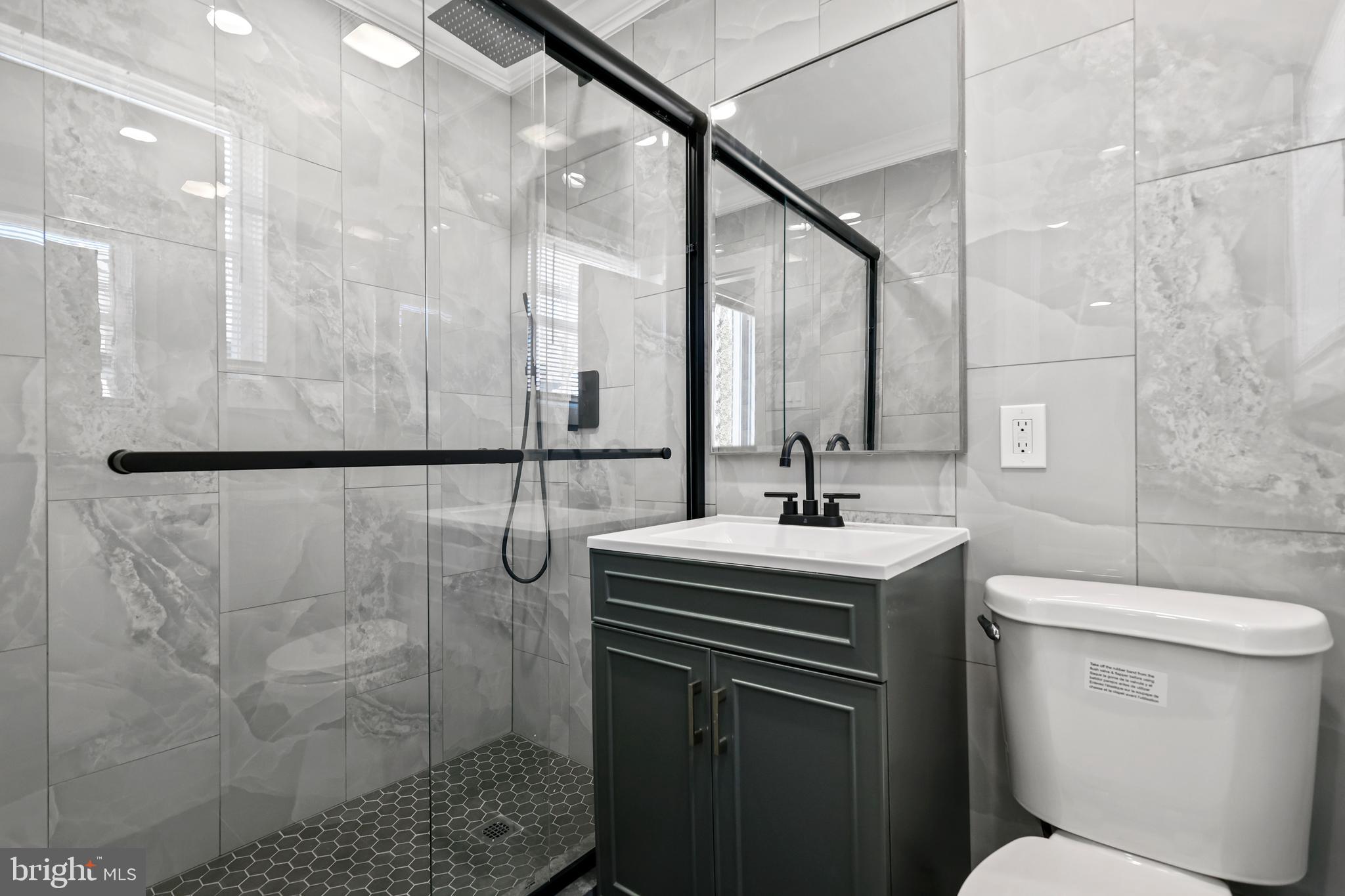 602 Wanamaker Road Jenkintown, PA 19046 - Photo 21 of 39 a bathroom with a sink toilet vanity and shower