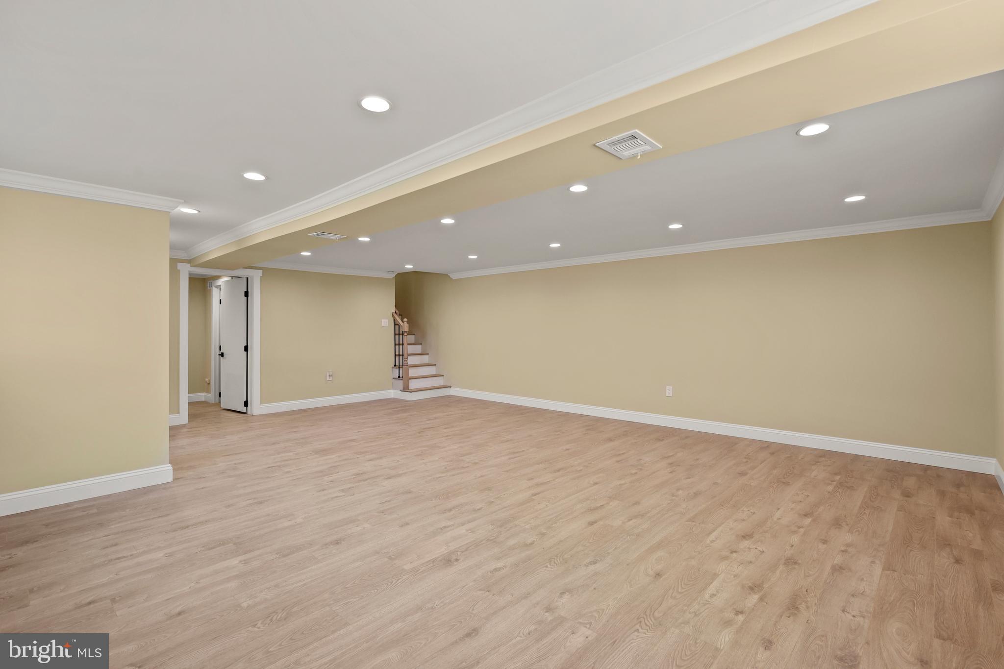 602 Wanamaker Road Jenkintown, PA 19046 - Photo 23 of 39 an empty room with wooden floor and natural light