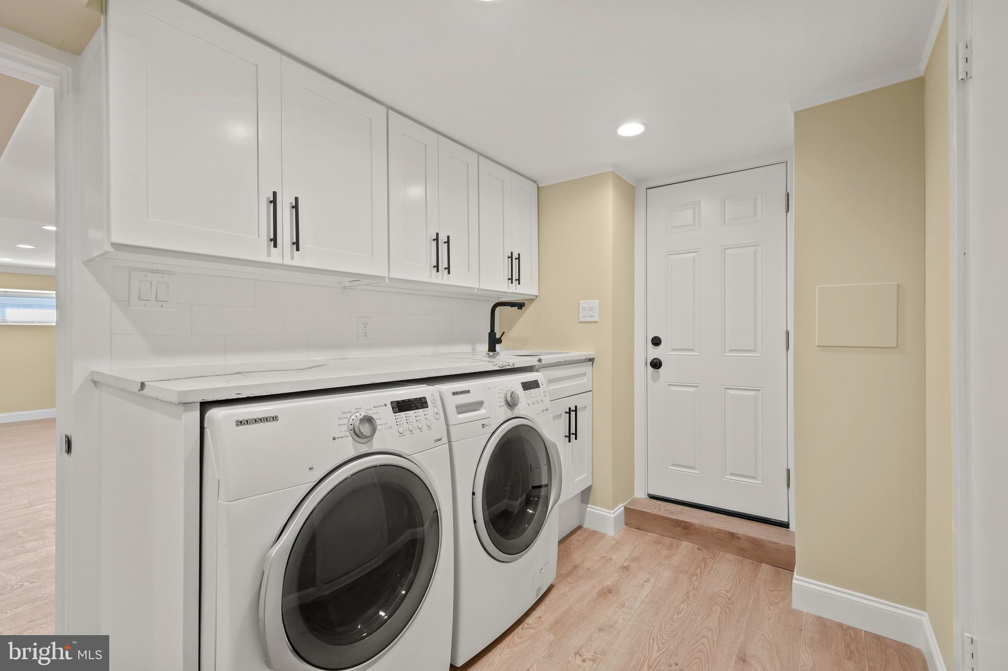 602 Wanamaker Road Jenkintown, PA 19046 - Photo 27 of 39 a view of storage and utility room with washer and dryer