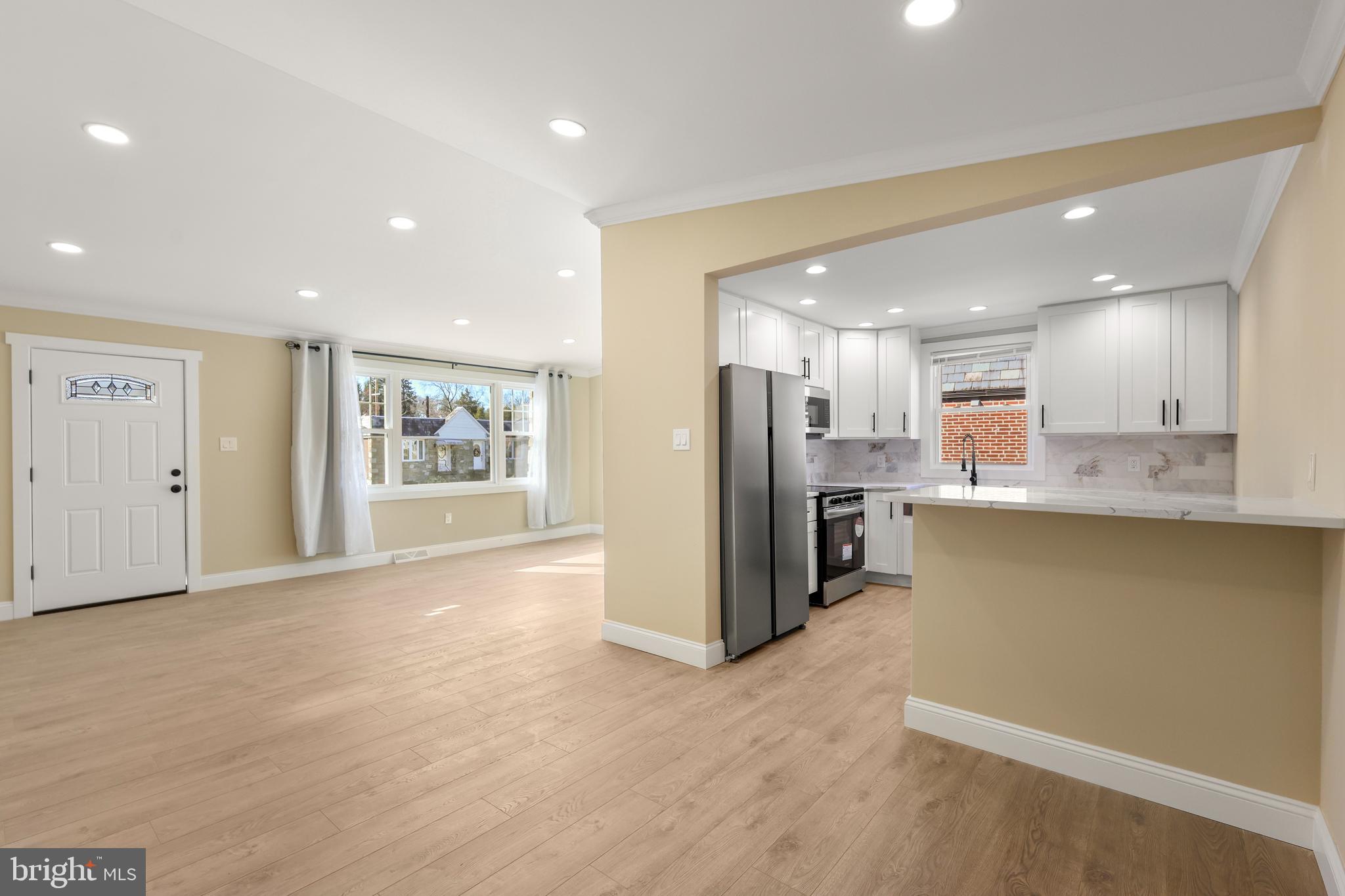 602 Wanamaker Road Jenkintown, PA 19046 - Photo 6 of 39 a view of kitchen with refrigerator and window