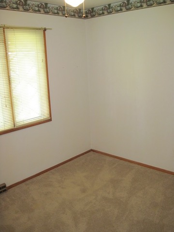 354 Cleveland Avenue Rochelle, IL 61068 - Photo 14 of 22 a view of a small space with a window