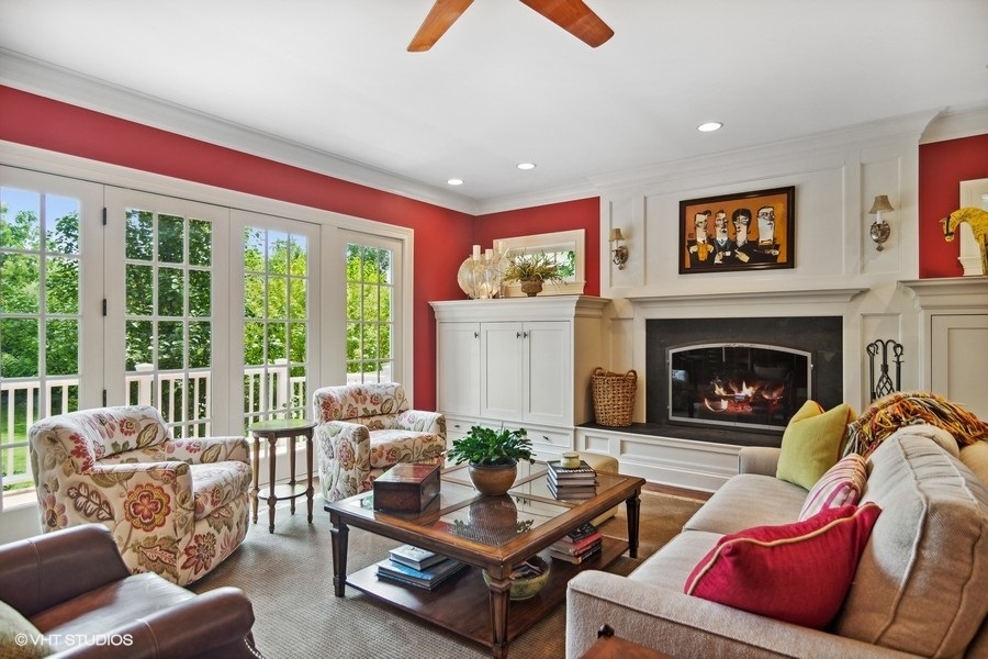 433 Signal Hill Road North Barrington, IL 60010 - Photo 11 of 44 a living room with furniture and a fireplace
