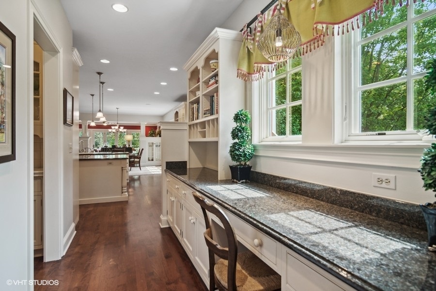 433 Signal Hill Road North Barrington, IL 60010 - Photo 12 of 44 a kitchen with stainless steel appliances granite countertop a stove and a refrigerator