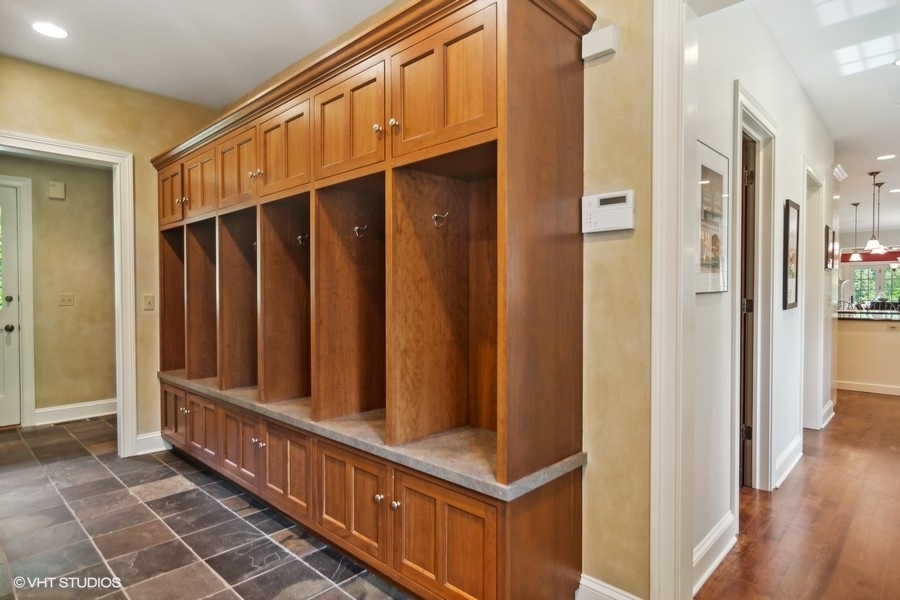 433 Signal Hill Road North Barrington, IL 60010 - Photo 13 of 44 a view of a hallway with wooden floor and staircase