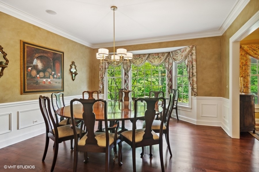 433 Signal Hill Road North Barrington, IL 60010 - Photo 16 of 44 a view of a dining room with furniture window and wooden floor