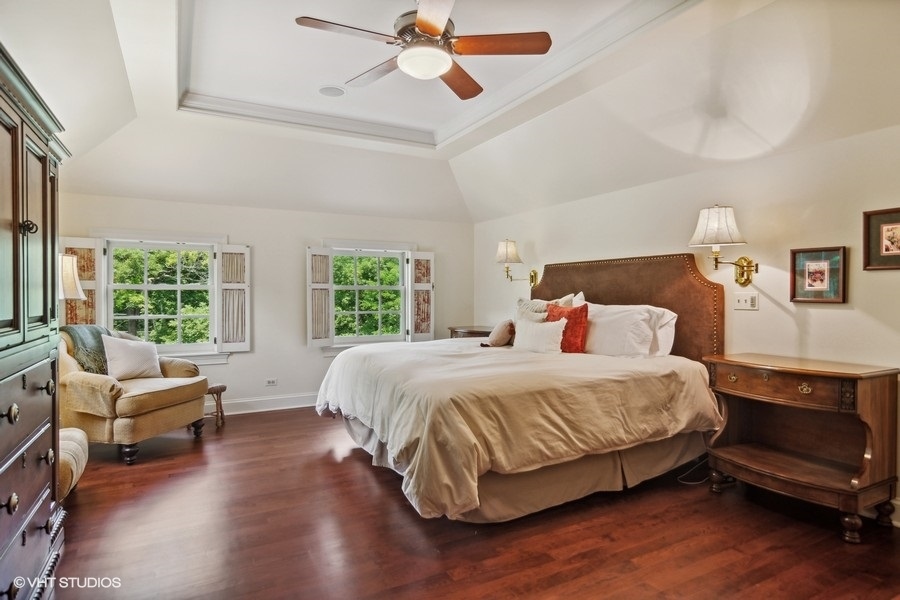 433 Signal Hill Road North Barrington, IL 60010 - Photo 19 of 44 a bedroom with a bed and wooden floor