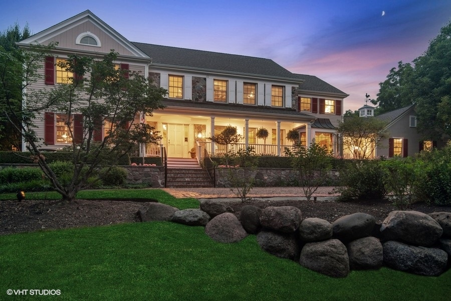 433 Signal Hill Road North Barrington, IL 60010 - Photo 2 of 44 a front view of a house with a yard and green space
