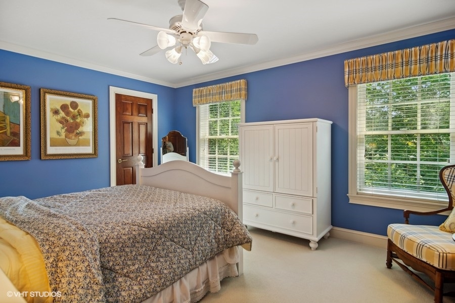 433 Signal Hill Road North Barrington, IL 60010 - Photo 22 of 44 a bedroom with a bed next to a window with outer view