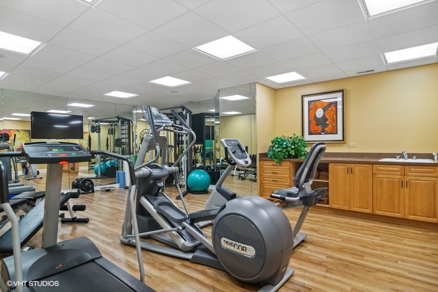 433 Signal Hill Road North Barrington, IL 60010 - Photo 28 of 44 a view of a room with gym equipment